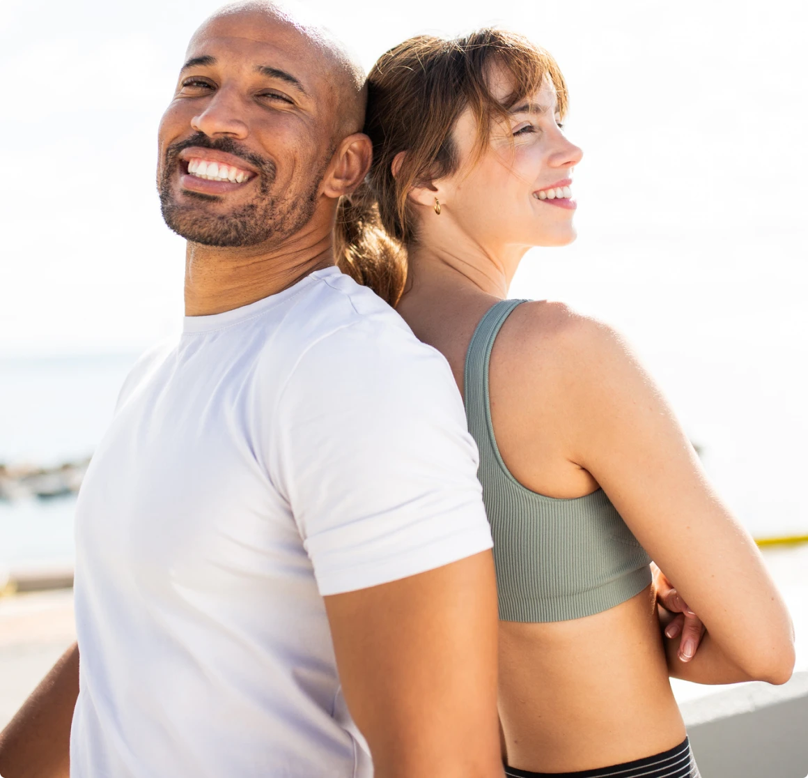 Smiling couple enjoying the sunny outdoors