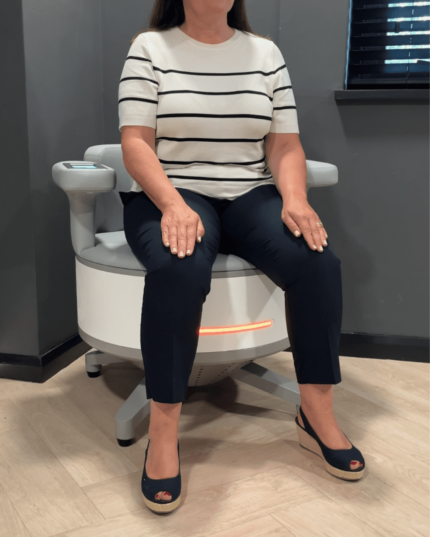 Woman seated on modern circular medical chair